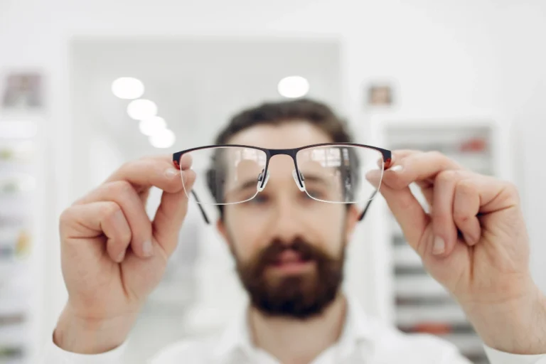 Handsome man in a optics shop