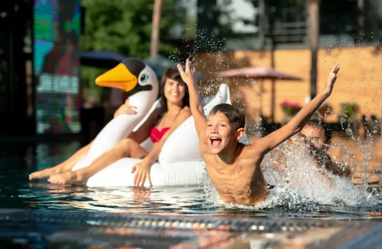 Parents with their son at the swimming pool